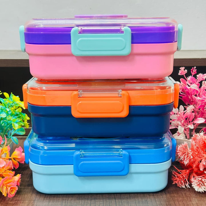 Stack of colorful collapsible storage containers with flowers in the background