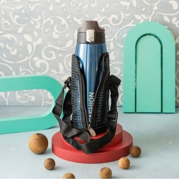 Blue water bottle with black holder on a red stand against a decorative background