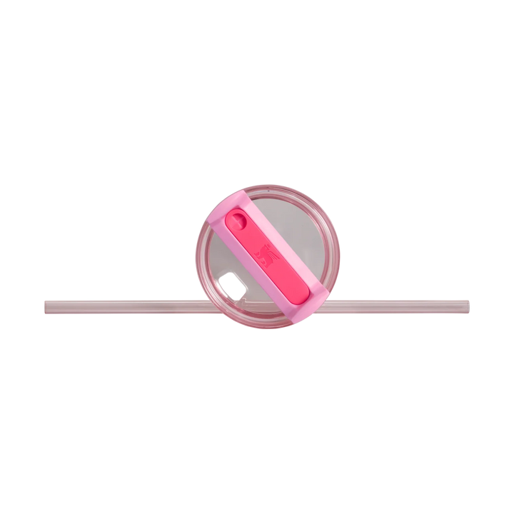 Pink straw with a clear cap on a white background