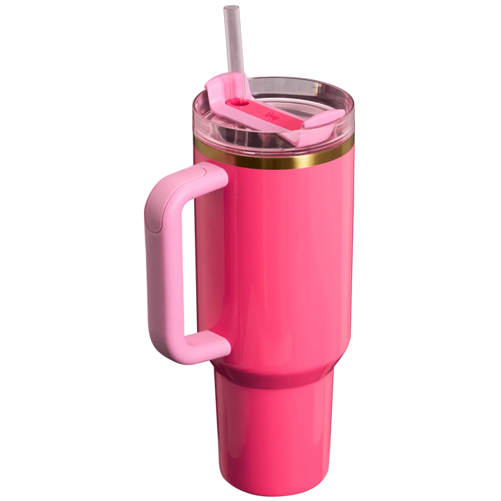 Pink insulated tumbler with a handle and straw on a white background