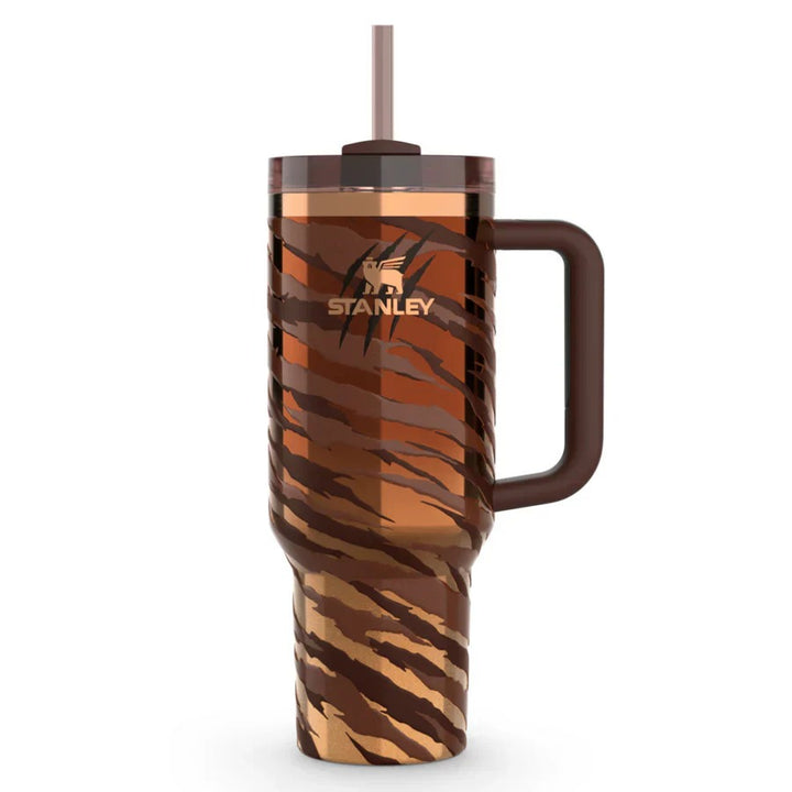 Stanley tumbler with tiger stripe pattern on a white background